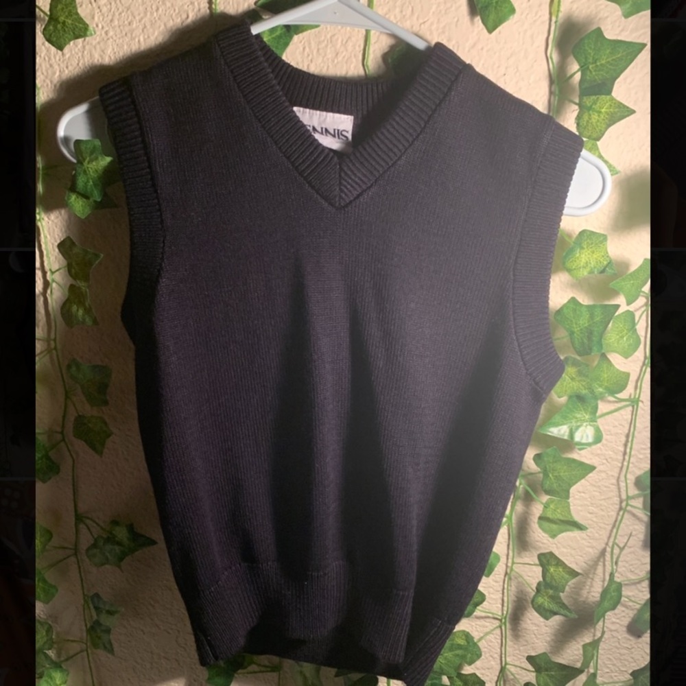super cute ,more of a fitted type sweater vest